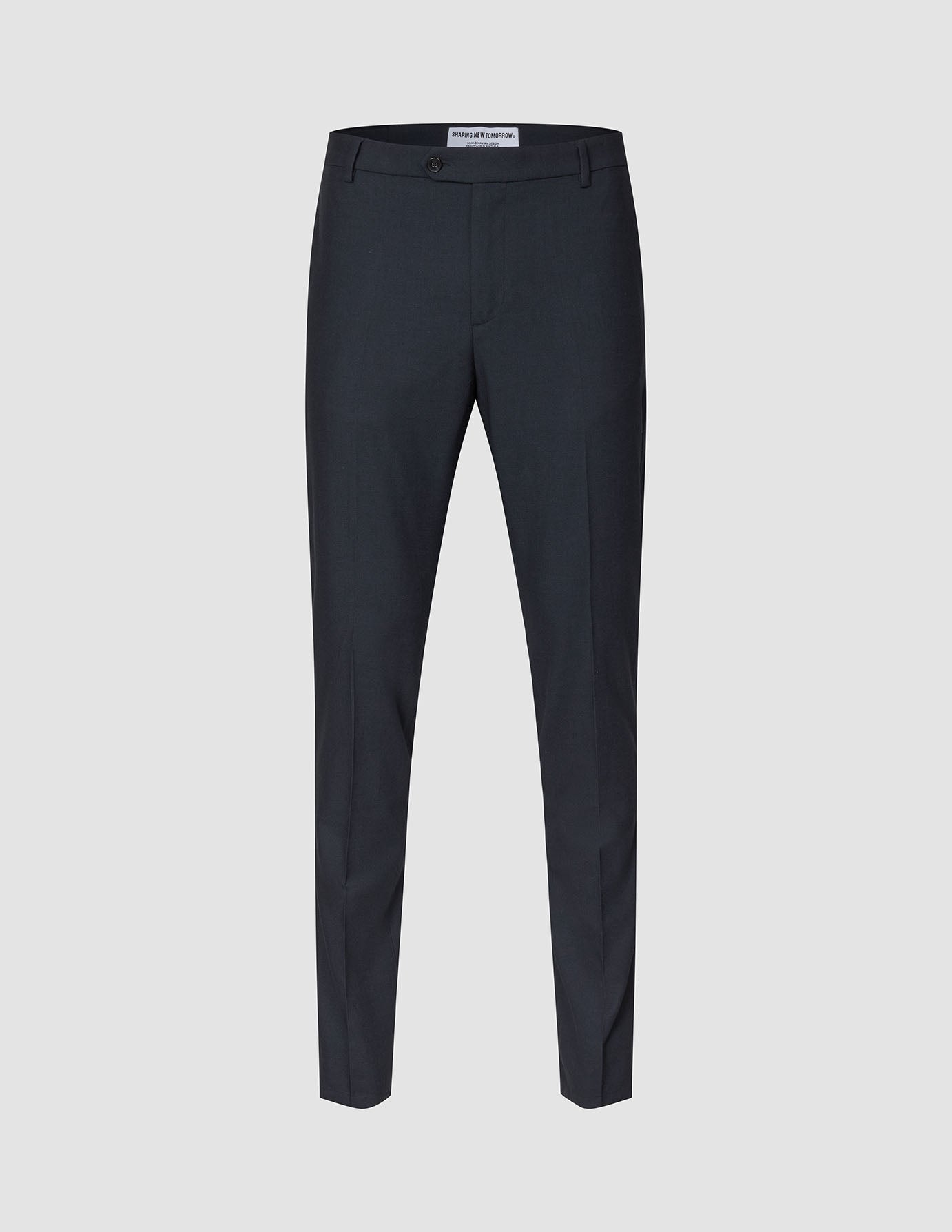 Motion Suit Pants Slim Midnight Blue – schmal geschnittene, marineblaue Anzughose mit 360°-Stretch und Knopfleiste vorne.